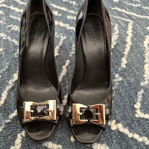 Authentic Gucci Black and Gold Stiletto Heels